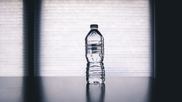 How does a water bottle reminder keep you from getting too acidic?